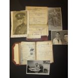 Two WWII soldiers service books with photographic postcards
