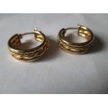 A pair of 9ct gold hoop earrings