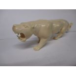 An early 20th century  Nigerian carved ivory figure of a panther, approx 19cm