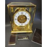 A Jager-LeCoultre Atmos mantel clock with original instruction book