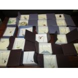 20 boxed silver necklaces with various pendents