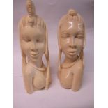 A pair of Nigerian  carved ivory female figures, approx 19cm