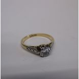 An 18ct gold & platinum ring set with a single diamond of approx 0.4ct