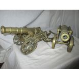 A pair of brass desk cannons