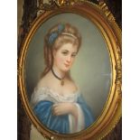 A 19th Century, pastel portrait in a gilt ribbon topped oval frame