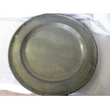 A large 18th Century pewter platter, touch marks to rear