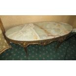 A gilt wood alabaster topped coffee table