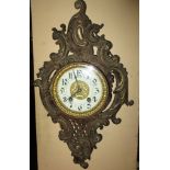 A continental ormolu enamelled dialled wall clock