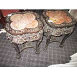 2 Burmese carved side tables with marble and mother of pearl inlay