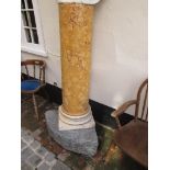 An antique marbleized scagliona column