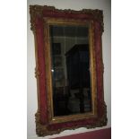 A 19th century bevelled edge gilt and velvet framed wall mirror