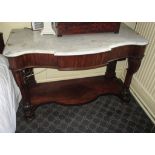 A Victorian mahogany dressing table with central frieze draw and marble top