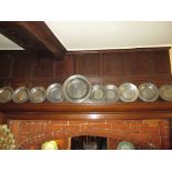 Pewter platter and plates, various touch marks and dates, from early 18th century