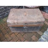 A tin trunk with contents of assorted items