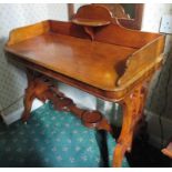 A Victorian mahogany side table, with decorative stretcher