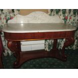 A Victorian mahogany marble topped wash stand