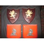 4 wall mounted shields with metal crests