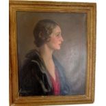 An early 20th century oil on canvas of a portrait of a woman, in gilt frame