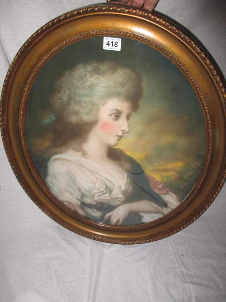 A 19th Century, painted oval, pastel of a woman