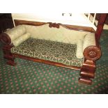 A 19th Century Biedermeier sofa with show wood frame