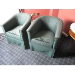 A pair of upholstered tub chairs