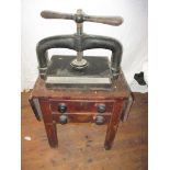 A book press on original pine stand C1850