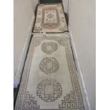 Two  vintage hand woven Kathmandu rugs