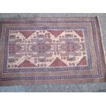 A vintage Baluchi rug