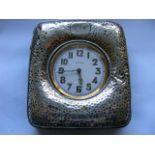 An Arts & Crafts Style Silver Framed Travel Clock