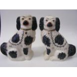 A Pair Of Staffordshire Spaniels