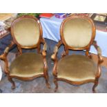 A Pair Of Walnut Chairs