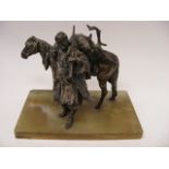 Spelter Figure Of Hunter With Deer Across Horse Back