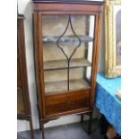 An Edwardian Display Cabinet