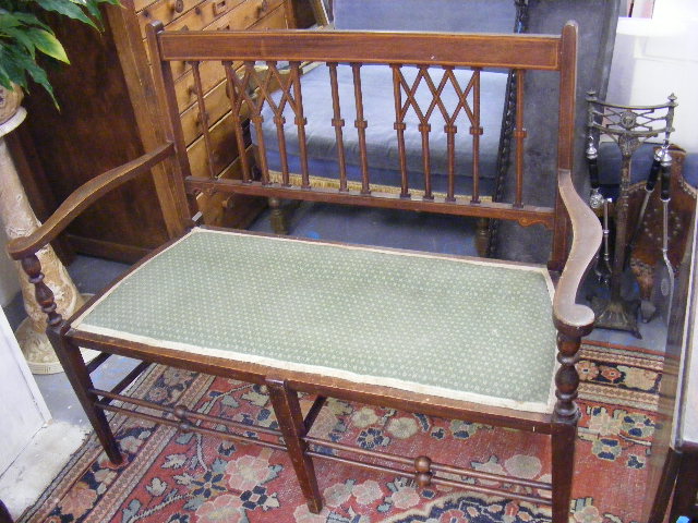 An Edwardian Sofa With Inlaid Decor