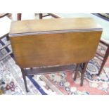 An Edwardian Mahogany Sutherland Table