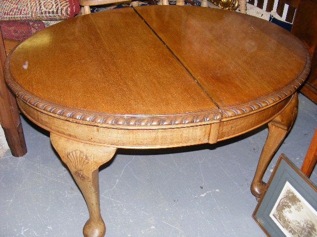 A Victorian Mahogany Piecrust Extending Table