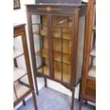 An Edwardian Display Cabinet