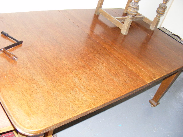 A Large Oak Farmhouse Table With Wind Extensions (Seat Upto Ten)