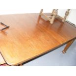 A Large Oak Farmhouse Table With Wind Extensions (Seat Upto Ten)