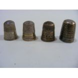 Four Silver Thimbles