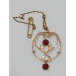 A C.1900 Gold Pendant With Red Stones
