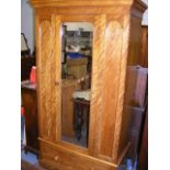 An Antique Satinwood Wardrobe