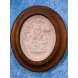 A Ceramic Plaque With Relief Figurative Decor