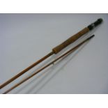 A Milward Split Cane Fishing Rod