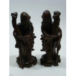 A Pair Of 18thC. Chinese Hardwood Carved Immortals