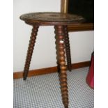 An Antique Carved Table With Bobbin Legs