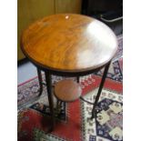 An Edwardian Mahogany Occasional Table