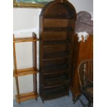 An Oak Alcove Bookcase With Arched Top