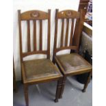 A Pair Of Oak Dining Chairs