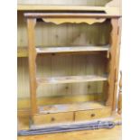 A Pine Wall Shelf With Drawers